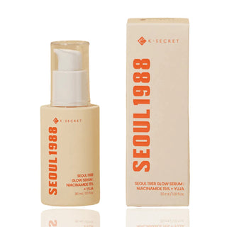 Flacon pompe beige Seoul 1988 Glow Serum K-Secret et sa boite en carton, typographie orange