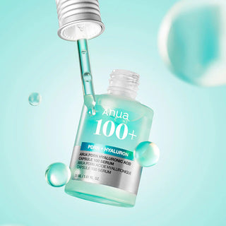 Anua PDRN Hyaluronic Acid Ampoule Serum - flacon flottant avec pipette et bulles sur fond turquoise