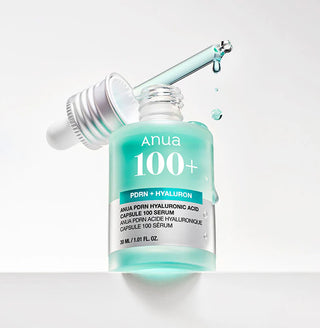 Anua PDRN Hyaluronic Acid Ampoule Serum - flacon ouvert avec pipette et gouttes turquoise en suspension