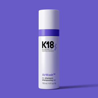 K18 AirWash Dry Shampoo - flacon violet sur fond violet uni avec ombre portee