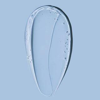 Haruharu Wonder Black Rice Hyaluronic Essence - goutte de texture gel transparent sur fond bleu