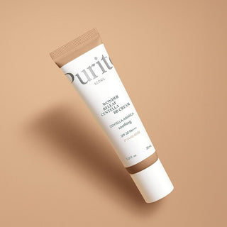 PURITO SEOUL BB Cream Centella #27 tube blanc incline sur fond beige dore