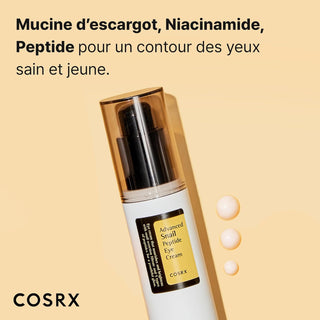 COSRX Advanced Snail Peptide Eye Cream incline sur fond jaune avec gouttes de texture creme a cote