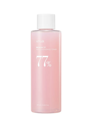 ANUA Peach 77 Niacin Essence Toner - flacon rose transparent 250ml avec bouchon blanc sur fond blanc