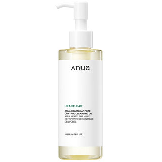 Flacon pompe ANUA Heartleaf Pore Control Cleansing Oil 200ml, huile transparente doree sur fond blanc
