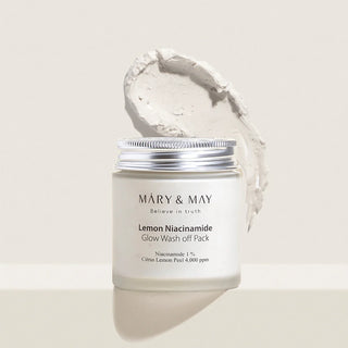 MARY&MAY Lemon Niacinamide Wash Off Pack - pot ferme avec trainee de texture blanche en arriere-plan