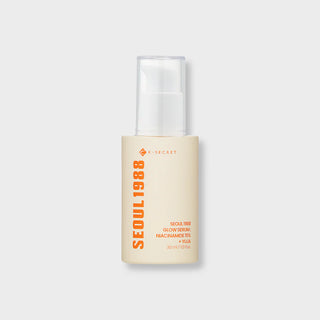 Flacon pompe Seoul 1988 Glow Serum K-Secret sur fond gris, capuchon transparent visible