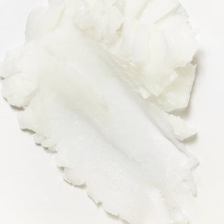Beauty of Joseon Radiance Cleansing Balm ouvert avec spatule et baume debordant sur fond beige
