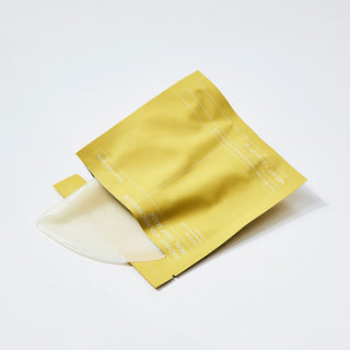 Sachet individuel BIODANCE Vita Niacinamide jaune dore ouvert avec masque gel blanc qui depasse