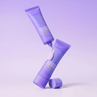 Deux tubes Isntree Onion Newpair empiles avec gel creme coulant entre les deux sur fond violet