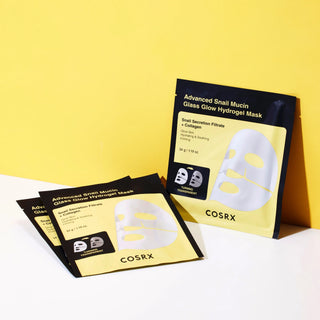 COSRX Masques Hydrogel Mucine Escargot trois sachets individuels et boite sur fond jaune