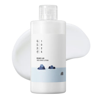 Round Lab 1025 Dokdo Lotion 200ml - flacon blanc opaque avec etiquette ilots Dokdo et texture laiteuse derriere