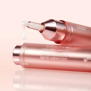 Gros plan sur l'embout du Medicube Collagen Glow Booster Serum avec goutte de serum translucide