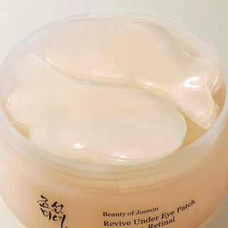 Pot ouvert Beauty of Joseon Revive Under Eye Patch rempli de patchs hydrogel nacrés - gros plan texture
