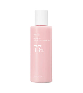 Flacon rose ANUA Peach 77 Niacin Conditioning Milk, bouchon blanc, mention 77% - 150 ml