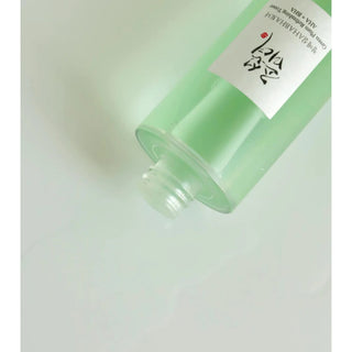 Beauty of Joseon Green Plum Refreshing Toner AHA BHA - flacon renverse montrant texture liquide verte