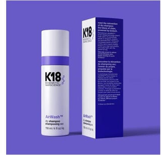 K18 AirWash Dry Shampoo - flacon et boite violette avec description bilingue sur fond violet