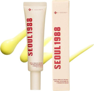 KSECRET Seoul 1988 Eye Cream tube et etui avec traces de texture jaune retinal sur fond beige