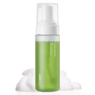 Celimax Noni Acne Bubble Cleanser - flacon pompe vert avec mousse blanche sur fond blanc